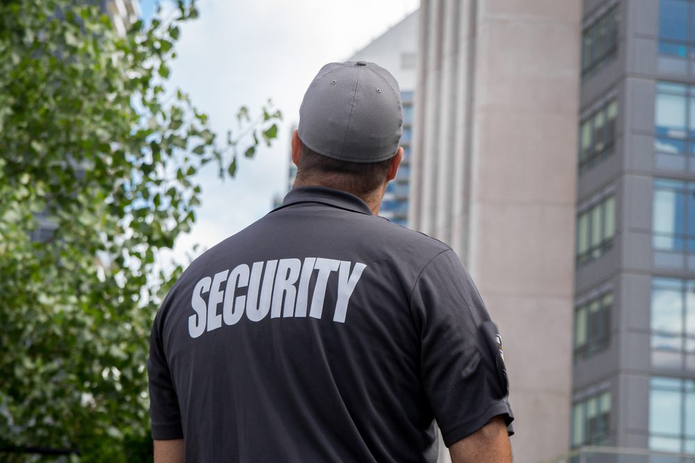 A,Security,Guard,In,Uniform,Patrolling,A,Residential,Area