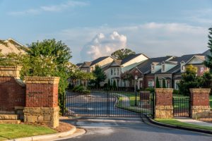 Typical,fresh,new,gated,community,entrance,in,united,states,southern