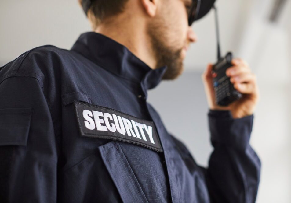 Close,Up,Cropped,Portrait,Of,Confident,Male,Security,Guard,Standing