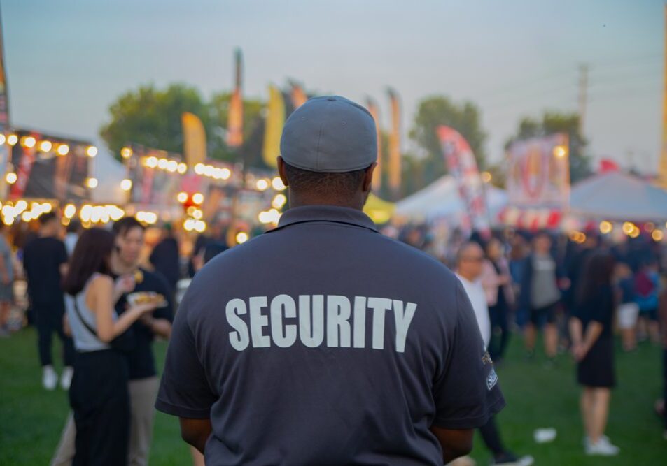 Security,Guard,Controlling,The,Traffic,And,Parking,At,Asian,Festival
